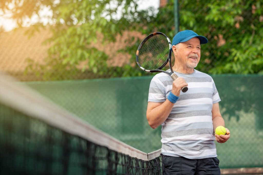 a resident plays tennis, one of many recreational activities for the elderly